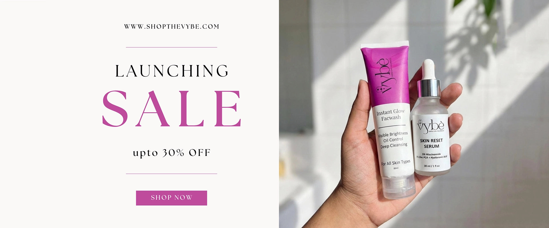 Hand holding vybe skincare products with promotional text for a sale on a white background