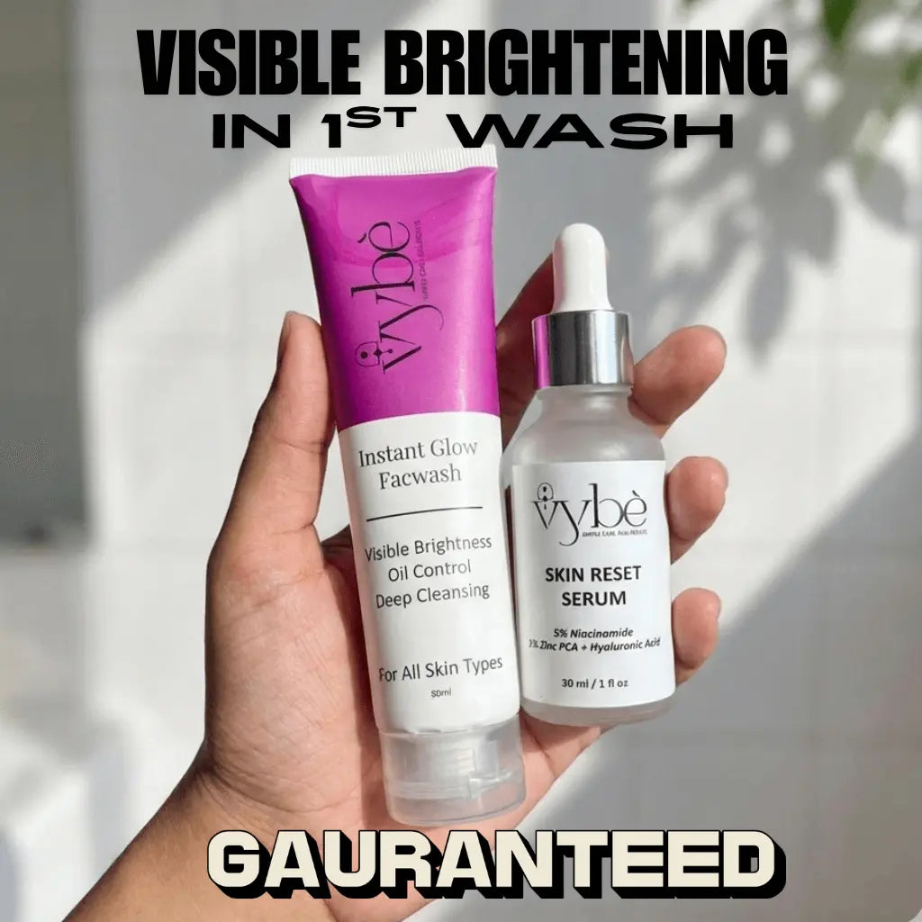Hand holding vybe skincare products with text about visible brightening in 1st wash.